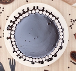 choco dripping snowy cake