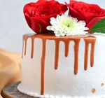 Round Drooling Vanilla Rose Cake